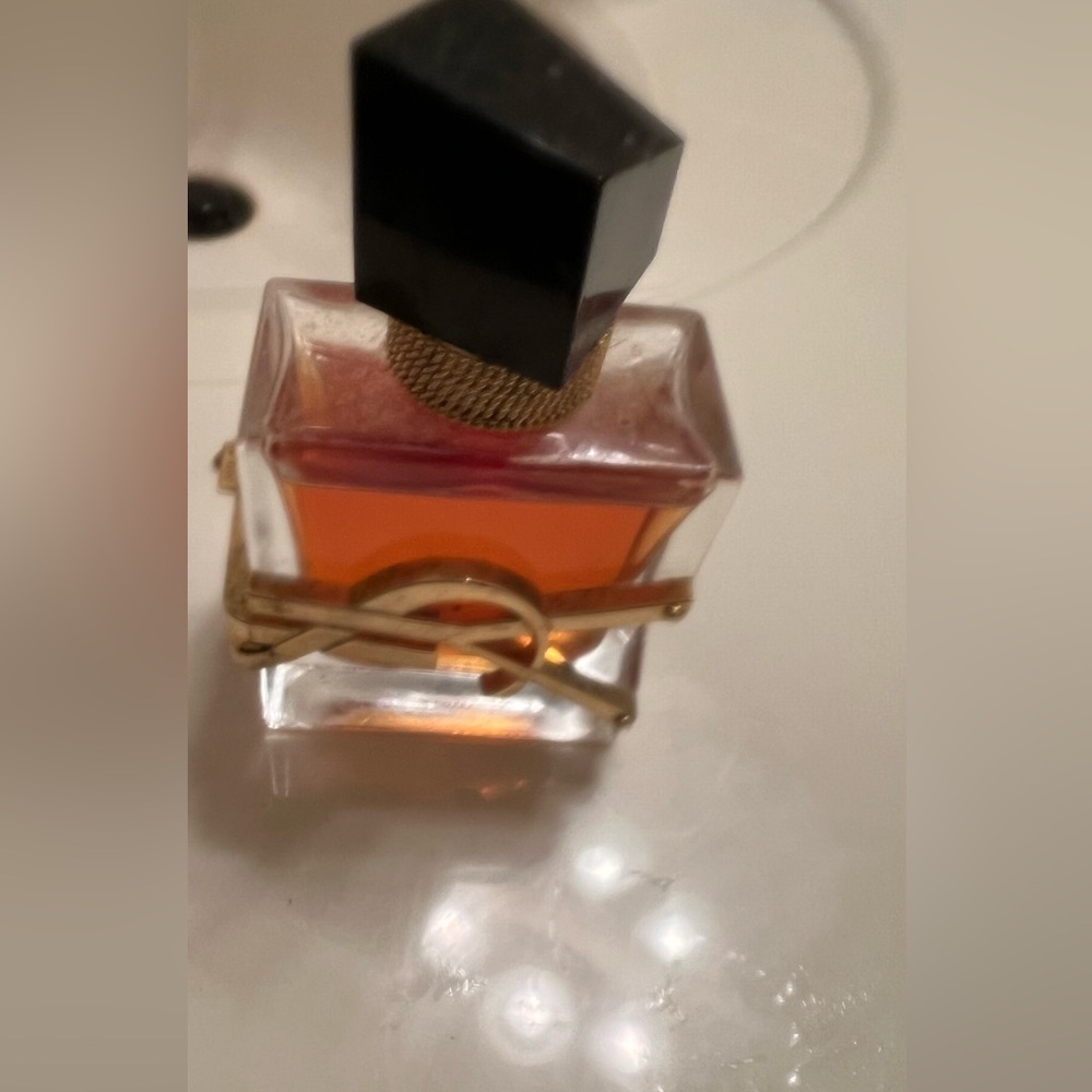 Yves Saint Laurent Fragrance with Black Cap and Gold Detail